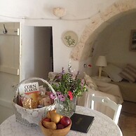 Trulli Mimosa by Pugliadamare