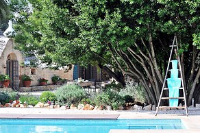 Trulli Mimosa by Pugliadamare