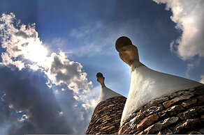 Trulli Mimosa by Pugliadamare