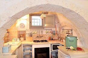 Trulli Mimosa by Pugliadamare