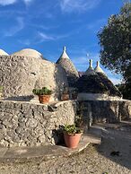 Trulli Mimosa by Pugliadamare