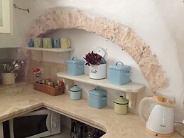 Trulli Mimosa by Pugliadamare