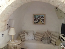 Trulli Mimosa by Pugliadamare