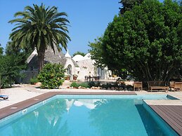 Trulli Mimosa by Pugliadamare