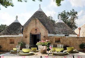 Trulli Mimosa by Pugliadamare