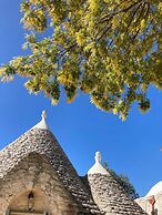 Trulli Mimosa by Pugliadamare