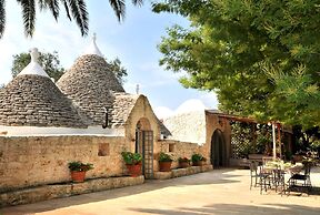 Trulli Mimosa by Pugliadamare