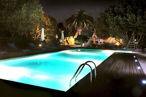 Trulli Mimosa by Pugliadamare