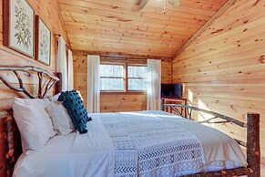 Secluded Cherry Log Cabin w/ Hot Tub + Swings!