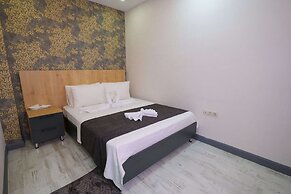 Minimalist Suit Otel