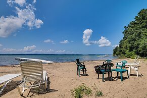 Torch Lake Getaway w/ Private Beach + Boat Dock!