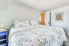 Torch Lake Getaway w/ Private Beach + Boat Dock!