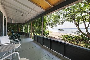 Torch Lake Getaway w/ Private Beach + Boat Dock!