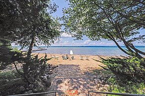 Torch Lake Getaway w/ Private Beach + Boat Dock!