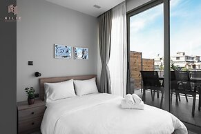 Avenue Studios & Apartments, Nilie Hospitality MGMT