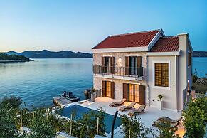Sea front Villa Draga - infinity pool