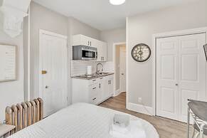 Trolley Teacup Charming Cozy Studio 1 Bedroom Apts by RedAwning