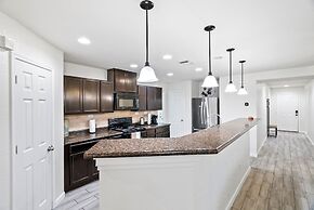 Unwind In Style And Comfort 3 Bedroom Home by RedAwning