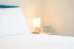 Unwind In Style And Comfort 3 Bedroom Home by RedAwning