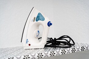 Unwind In Style And Comfort 3 Bedroom Home by RedAwning