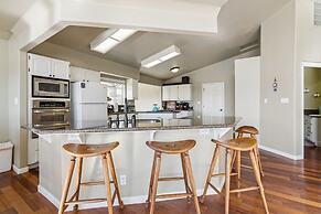 Elegant Escape 4 Bedroom Home by RedAwning