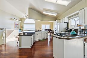 Elegant Escape 4 Bedroom Home by RedAwning