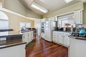 Elegant Escape 4 Bedroom Home by RedAwning