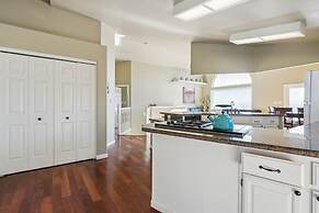 Elegant Escape 4 Bedroom Home by RedAwning