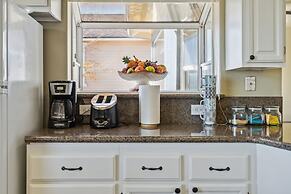 Elegant Escape 4 Bedroom Home by RedAwning