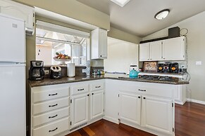 Elegant Escape 4 Bedroom Home by RedAwning