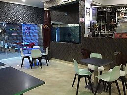 Ugwis Hotel and Suites