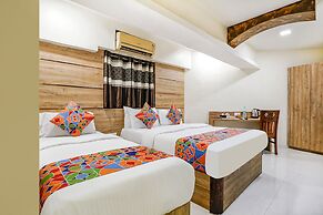 Fabexpress Amber Corp Inn