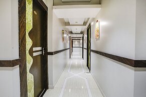 Fabexpress Amber Corp Inn