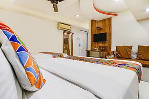 Fabexpress Amber Corp Inn