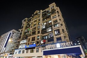 Fabexpress Amber Corp Inn