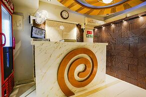 Fabexpress Amber Corp Inn