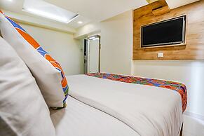 Fabexpress Amber Corp Inn