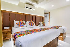 Fabexpress Amber Corp Inn