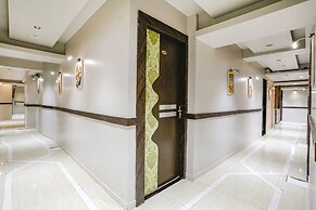 Fabexpress Amber Corp Inn