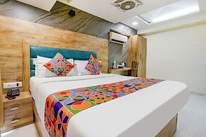 Fabexpress Amber Corp Inn