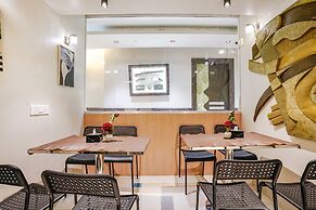 Fabexpress Amber Corp Inn