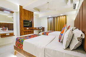 Fabexpress Amber Corp Inn