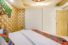 Fabexpress Amber Corp Inn