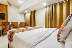 Fabexpress Amber Corp Inn