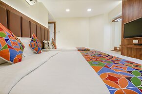 Fabexpress Amber Corp Inn