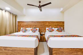 Fabexpress Amber Corp Inn