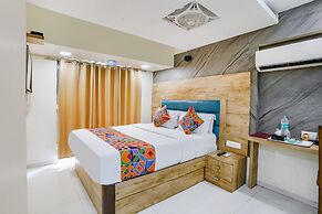 Fabexpress Amber Corp Inn