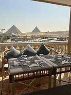 Al Fouad Palace Pyramids View
