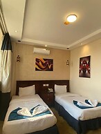 Al Fouad Palace Pyramids View