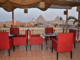 Al Fouad Palace Pyramids View